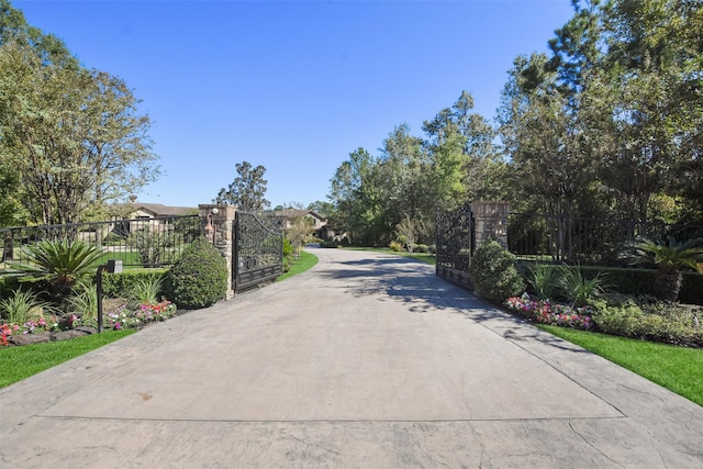 27918 Hansons Ct, Spring, TX 77386 - view of concrete surface with a gated entry