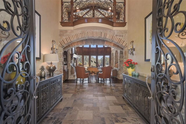 27918 Hansons Ct, Spring, TX 77386 - foyer with stone finish floors and arched walkways