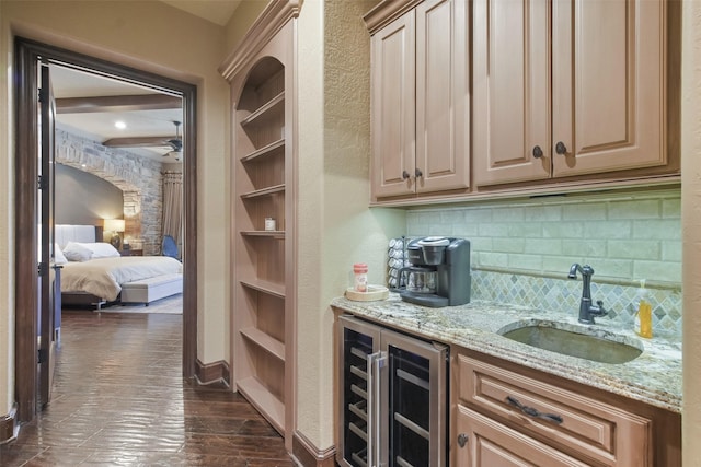 27918 Hansons Ct, Spring, TX 77386 - indoor wet bar featuring beverage cooler, a ceiling fan, backsplash, dark wood finished floors, and built in features