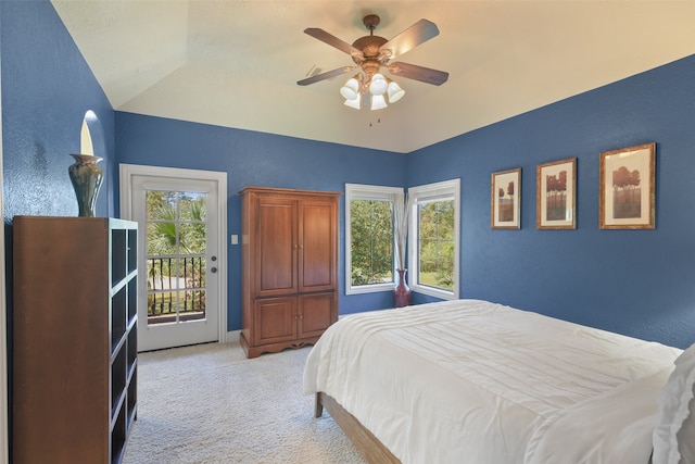 bedroom featuring access to exterior, light carpet, multiple windows, and ceiling fan