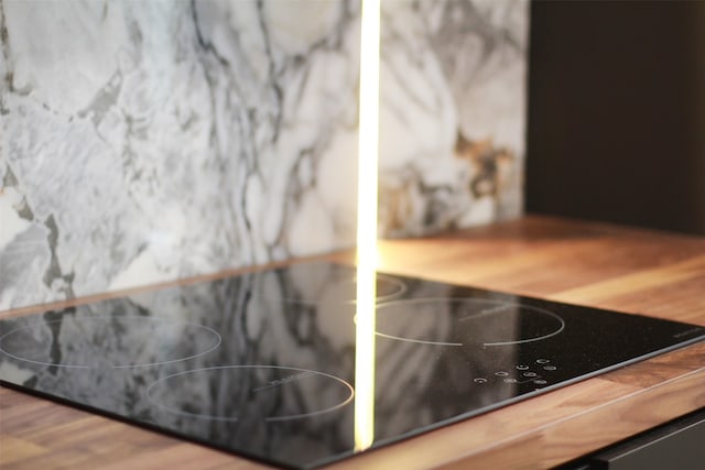 interior details featuring black electric cooktop