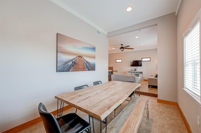 dining space with plenty of natural light, light tile patterned floors, and ceiling fan