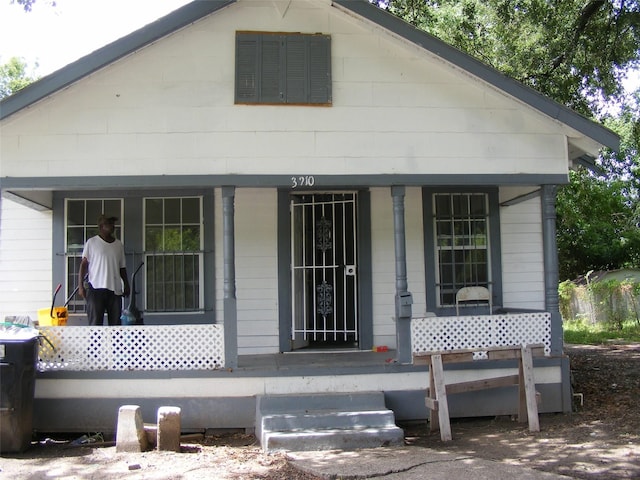 view of front of home featuring covered porch