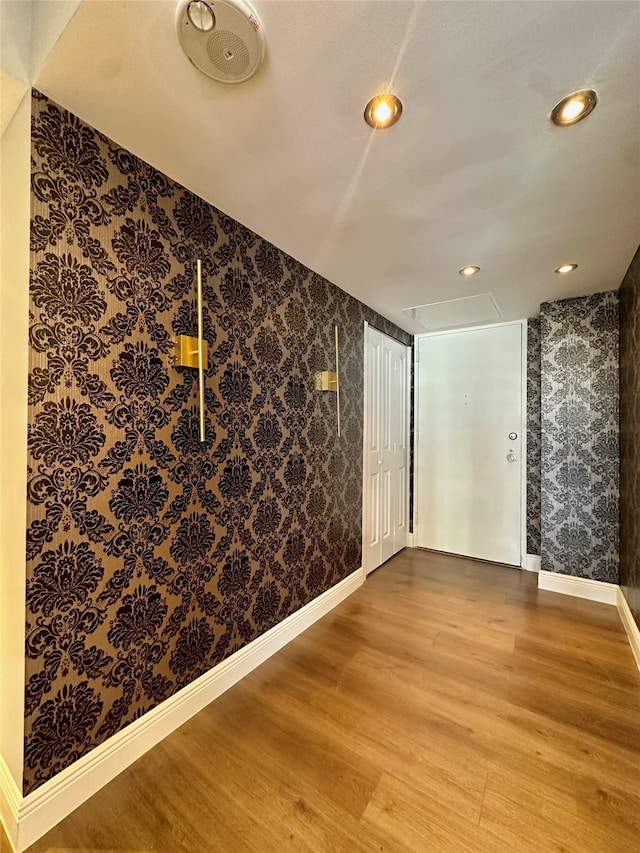 empty room featuring hardwood / wood-style flooring