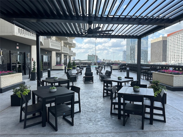 dining space with a city view, expansive windows, and a water view