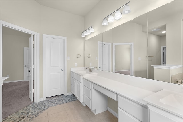 bathroom featuring vanity and tile patterned flooring