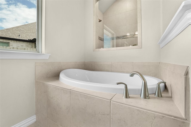 bathroom with lofted ceiling and plus walk in shower