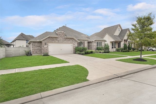 french country home with a front lawn and a garage