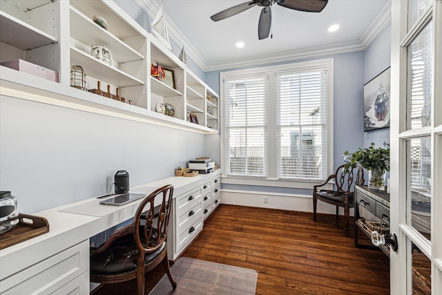 office featuring dark hardwood / wood-style floors, built in desk, plenty of natural light, and ceiling fan