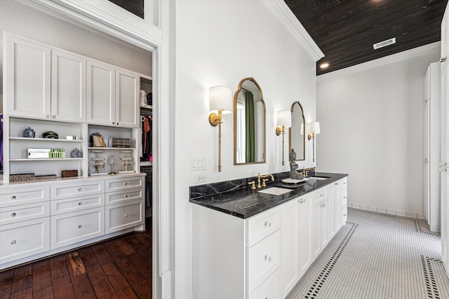 bathroom with vanity, crown molding, wood-type flooring, and wooden ceiling