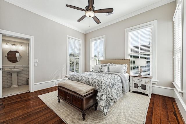 bedroom with dark wood-type flooring, ceiling fan, ornamental molding, and ensuite bath