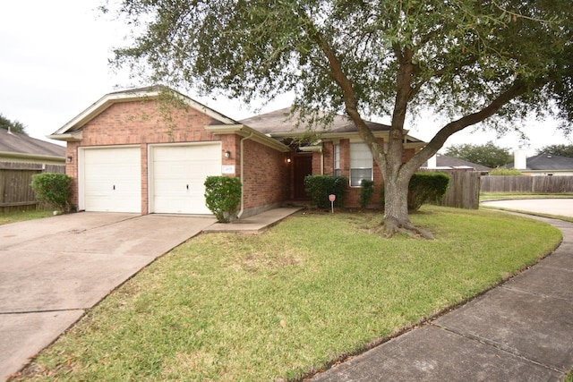 single story home featuring a front lawn and a garage