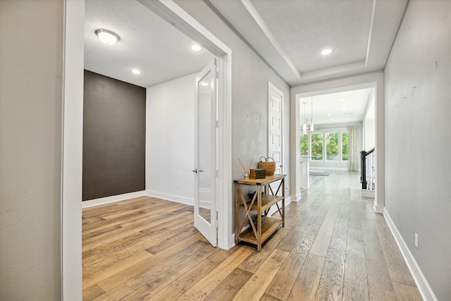 corridor featuring light wood-type flooring