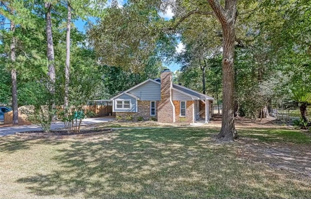 ranch-style house with a front yard