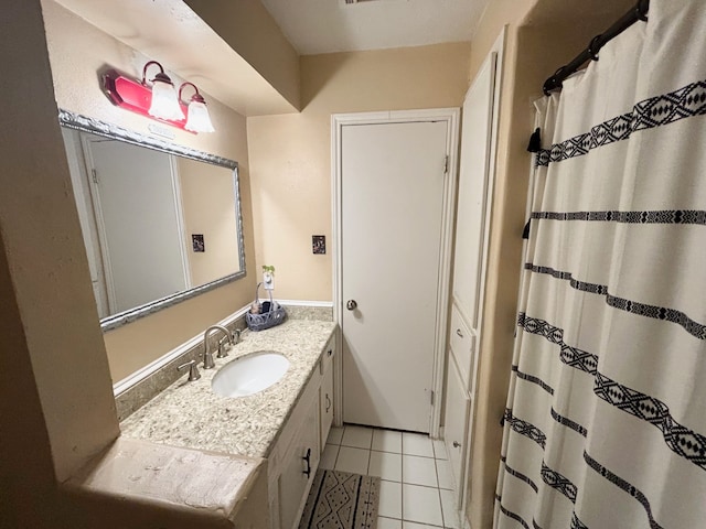 bathroom featuring vanity and tile patterned flooring