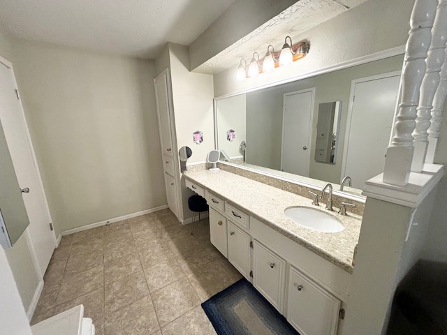 bathroom featuring vanity and tile patterned floors