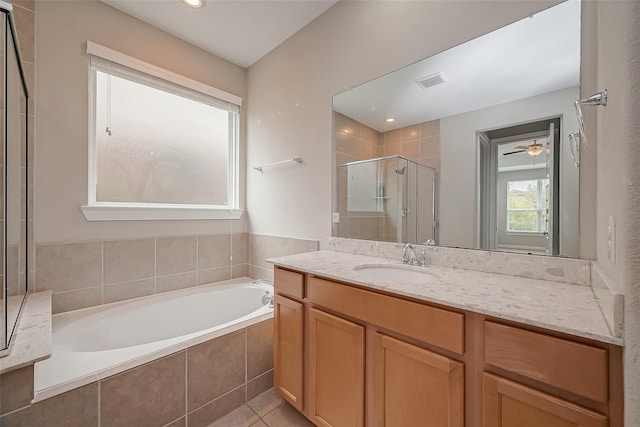 bathroom with vanity, ceiling fan, independent shower and bath, and tile patterned flooring