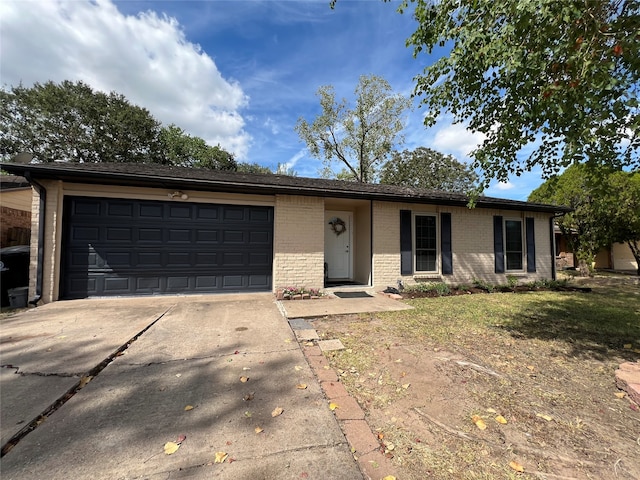 ranch-style home with a garage