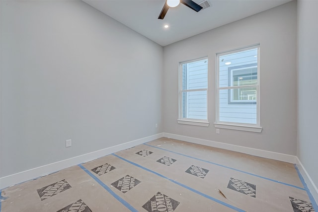 unfurnished room with ceiling fan