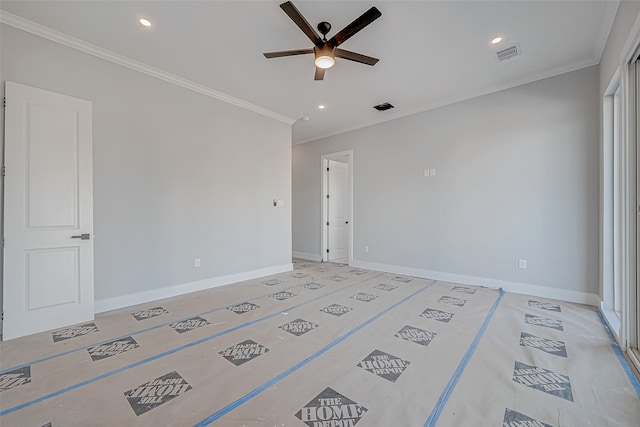 empty room featuring crown molding and ceiling fan