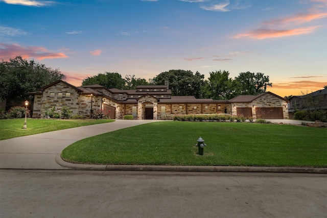 prairie-style house featuring a lawn