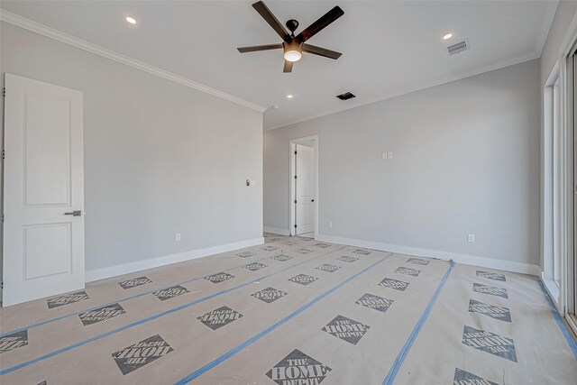 unfurnished room featuring ceiling fan and ornamental molding