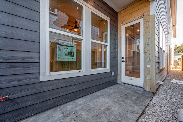 entrance to property with a patio area