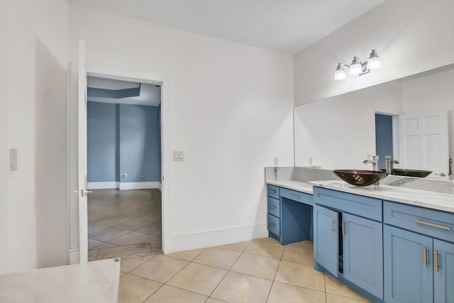 bathroom with vanity and tile patterned floors