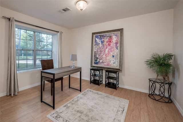 office area featuring light hardwood / wood-style floors