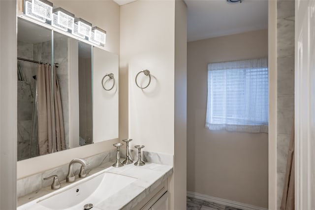 bathroom with vanity and a shower with shower curtain