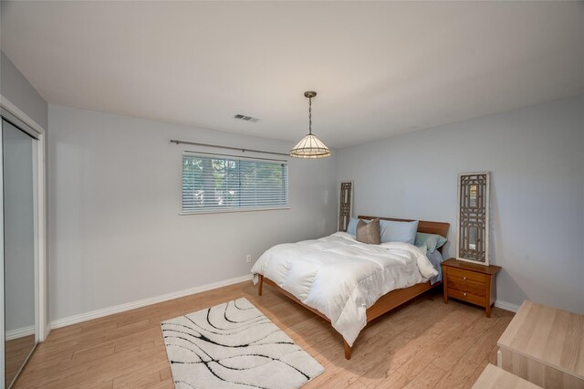 bedroom featuring light wood-type flooring