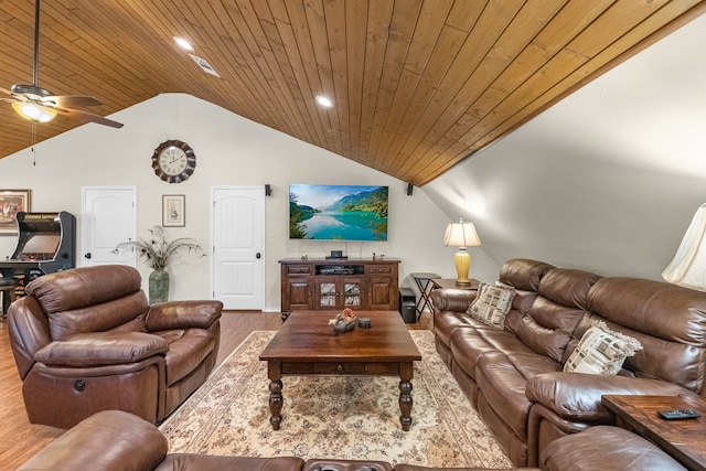 living room featuring vaulted ceiling, wood ceiling, hardwood / wood-style flooring, and ceiling fan