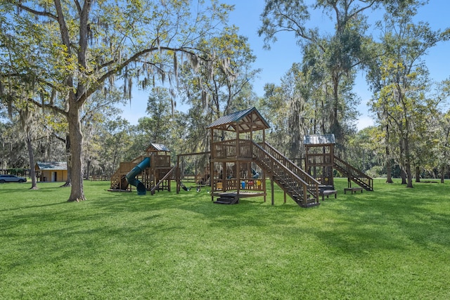 view of play area featuring a lawn