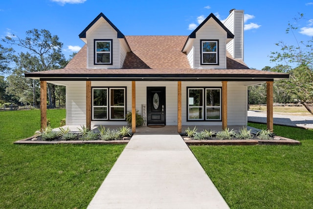 view of front of home featuring a porch and a front lawn