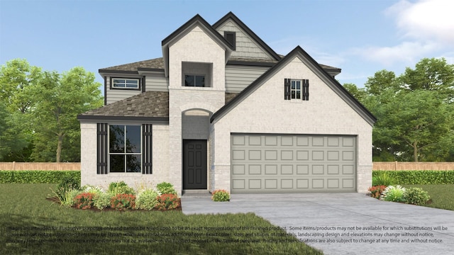 view of front of house with a garage and a front lawn