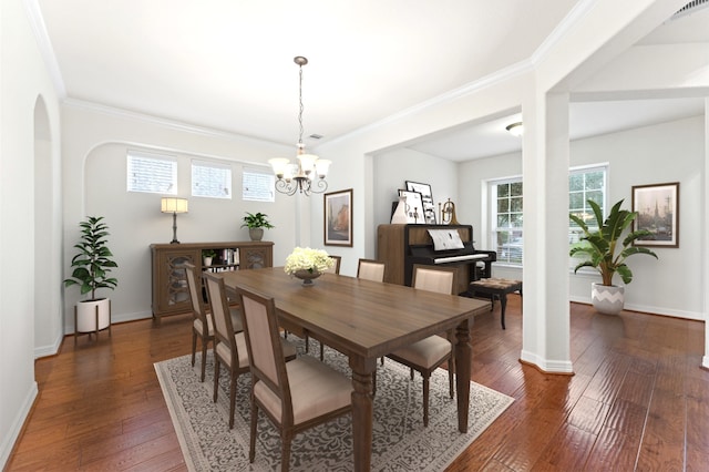 dining space featuring crown molding, a notable chandelier, and dark hardwood / wood-style flooring