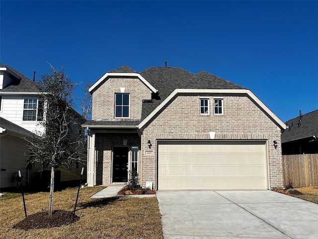 front of property featuring a garage