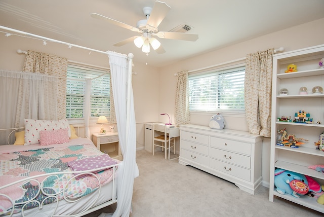 carpeted bedroom with ceiling fan