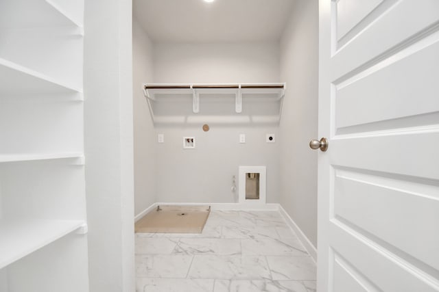 clothes washing area featuring hookup for a gas dryer, electric dryer hookup, and hookup for a washing machine