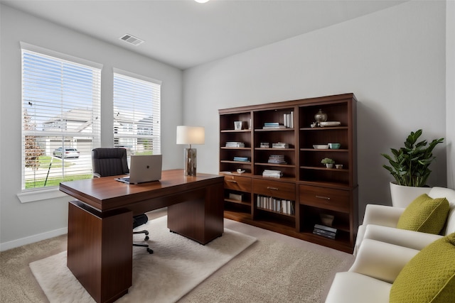 office area with a wealth of natural light and carpet floors