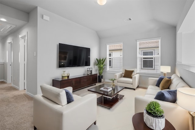 carpeted living room featuring lofted ceiling