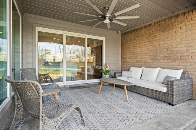 view of patio with outdoor lounge area and ceiling fan