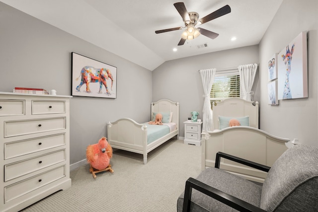 carpeted bedroom with lofted ceiling and ceiling fan