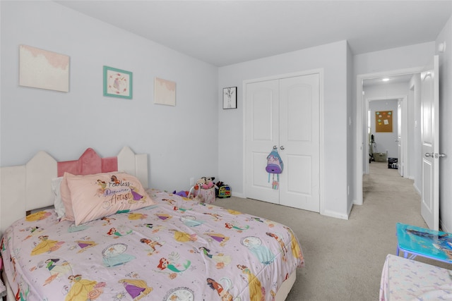 carpeted bedroom with a closet