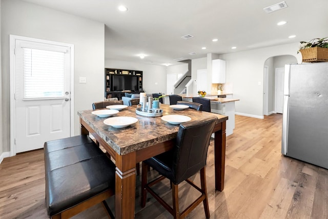 dining room featuring light hardwood / wood-style floors