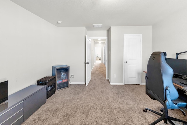 carpeted office space with wine cooler