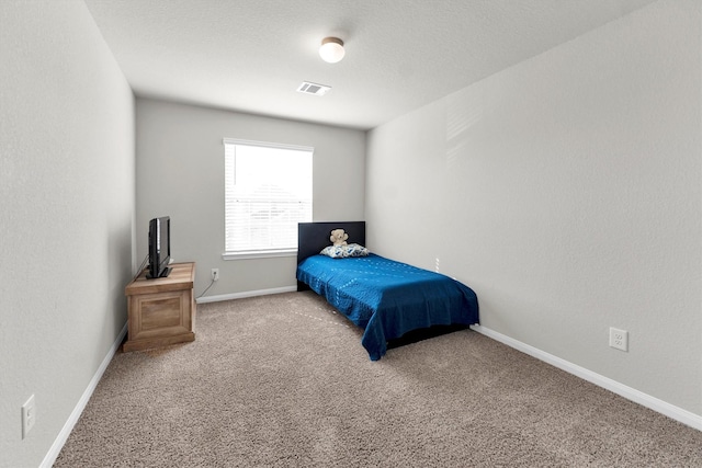 bedroom featuring carpet floors