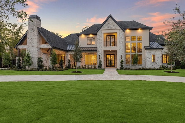 view of front of house with a lawn