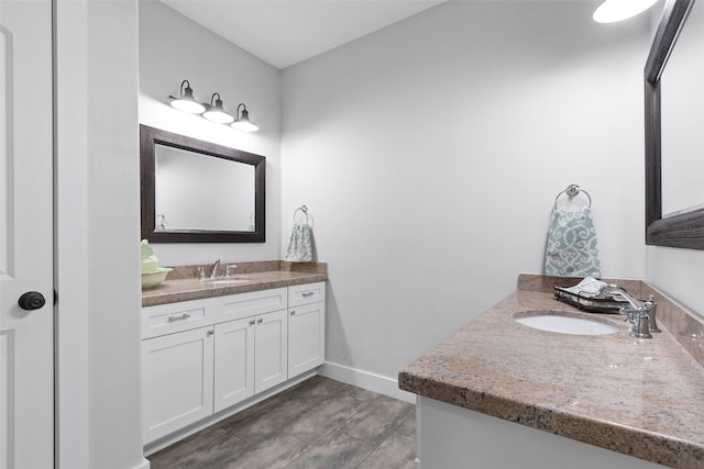 bathroom featuring vanity and hardwood / wood-style flooring