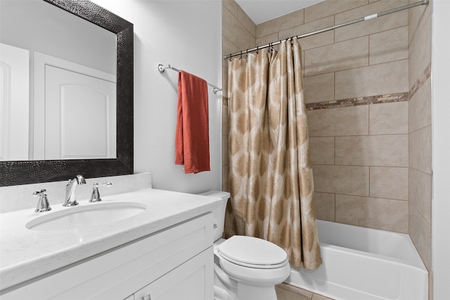 full bathroom featuring tile patterned flooring, shower / tub combo with curtain, vanity, and toilet